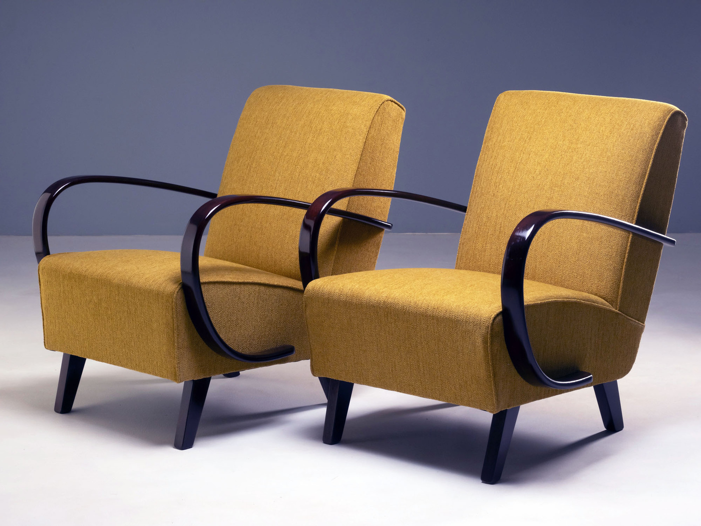 Matching H-227 armchairs by Jindřich Halabala, restored